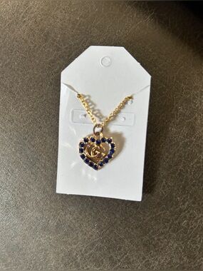 Gold Heart Pendant Necklace with Blue Stones